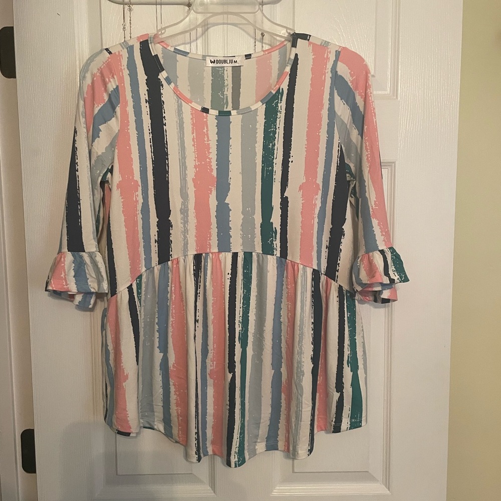 5 for $20 Ladies size Medium babydoll style shirt